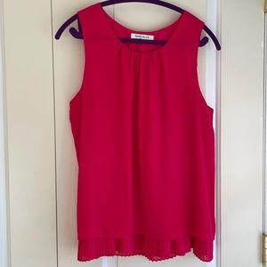 Never worn Rose and Olive Sleeveless polyester top on hot pink in size L.